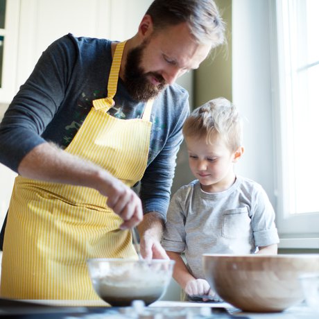 Father and son baking